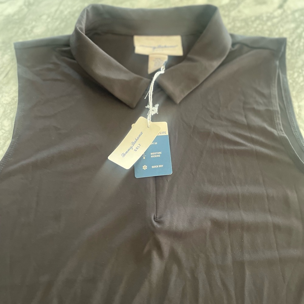 New with tags.  Womens Tommy Bahama Golf shirt.